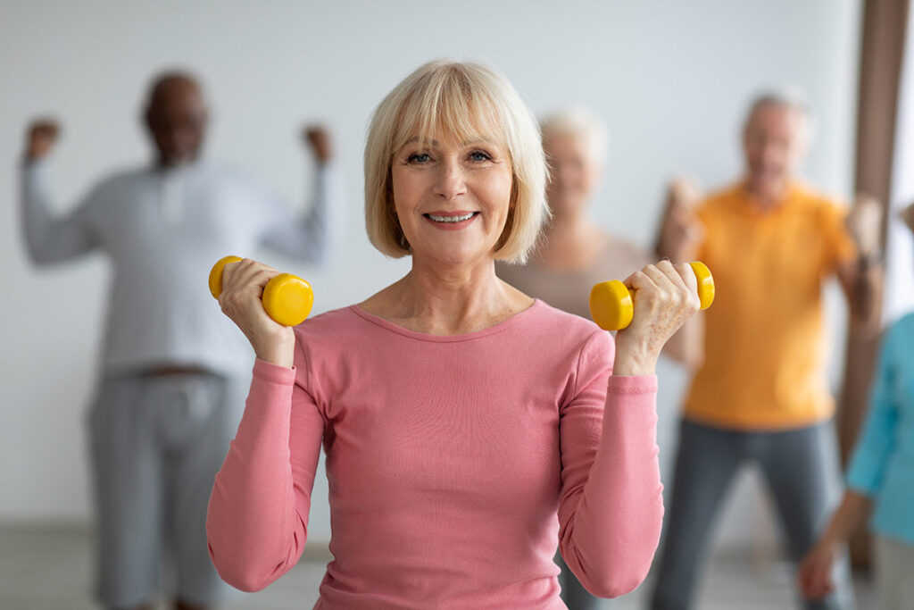 happy middle aged senior exercising