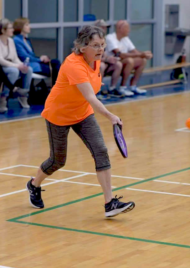 Senior woman playing Pickleball